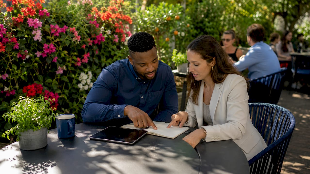 Couple discussing financial plans after a home sale