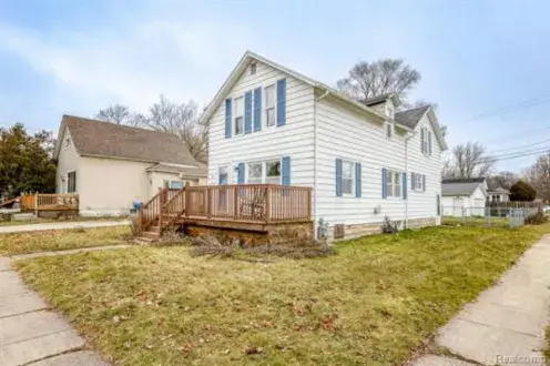 A home showcasing a porch and deck in Allen Park, MI & Center Line, MI